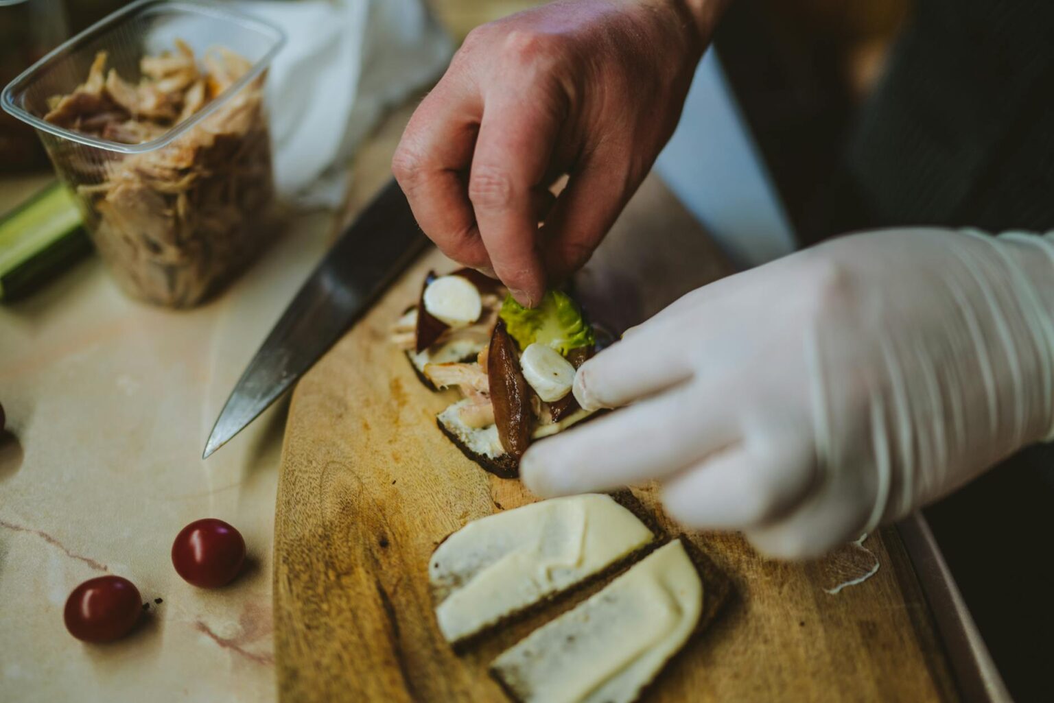 Professional meal preparation setup with organized ingredients and planning materials