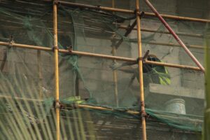 Construction site with scaffolding and building materials creating an industrial backdrop