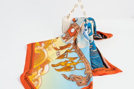 Professional woman wearing elegant silk scarf in business setting
