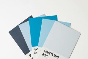 Colorful fabric swatches arranged for professional color analysis consultation