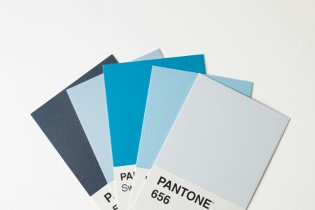 Colorful fabric swatches arranged for professional color analysis consultation