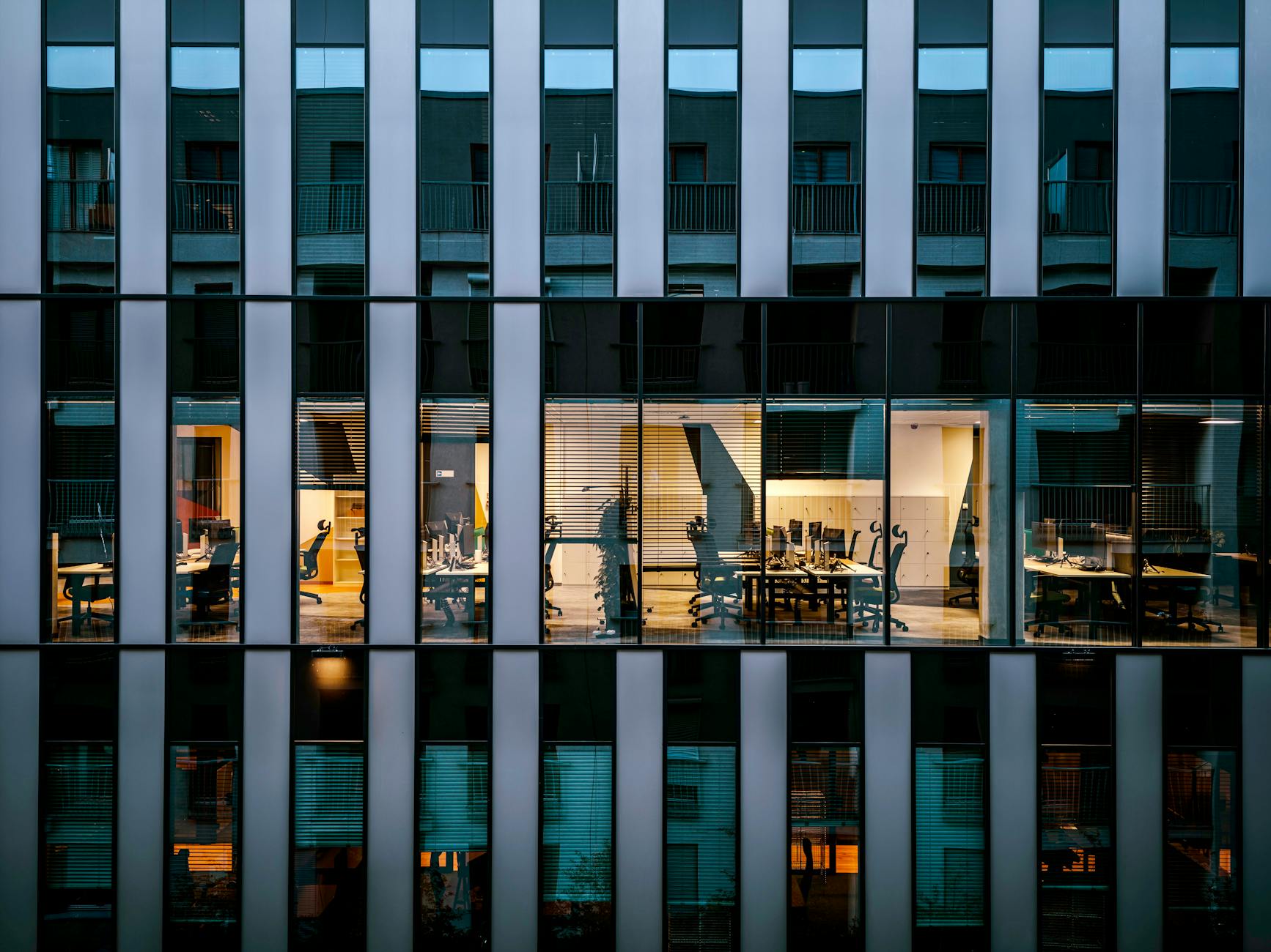 Modern office building exterior representing Wall Street financial district
