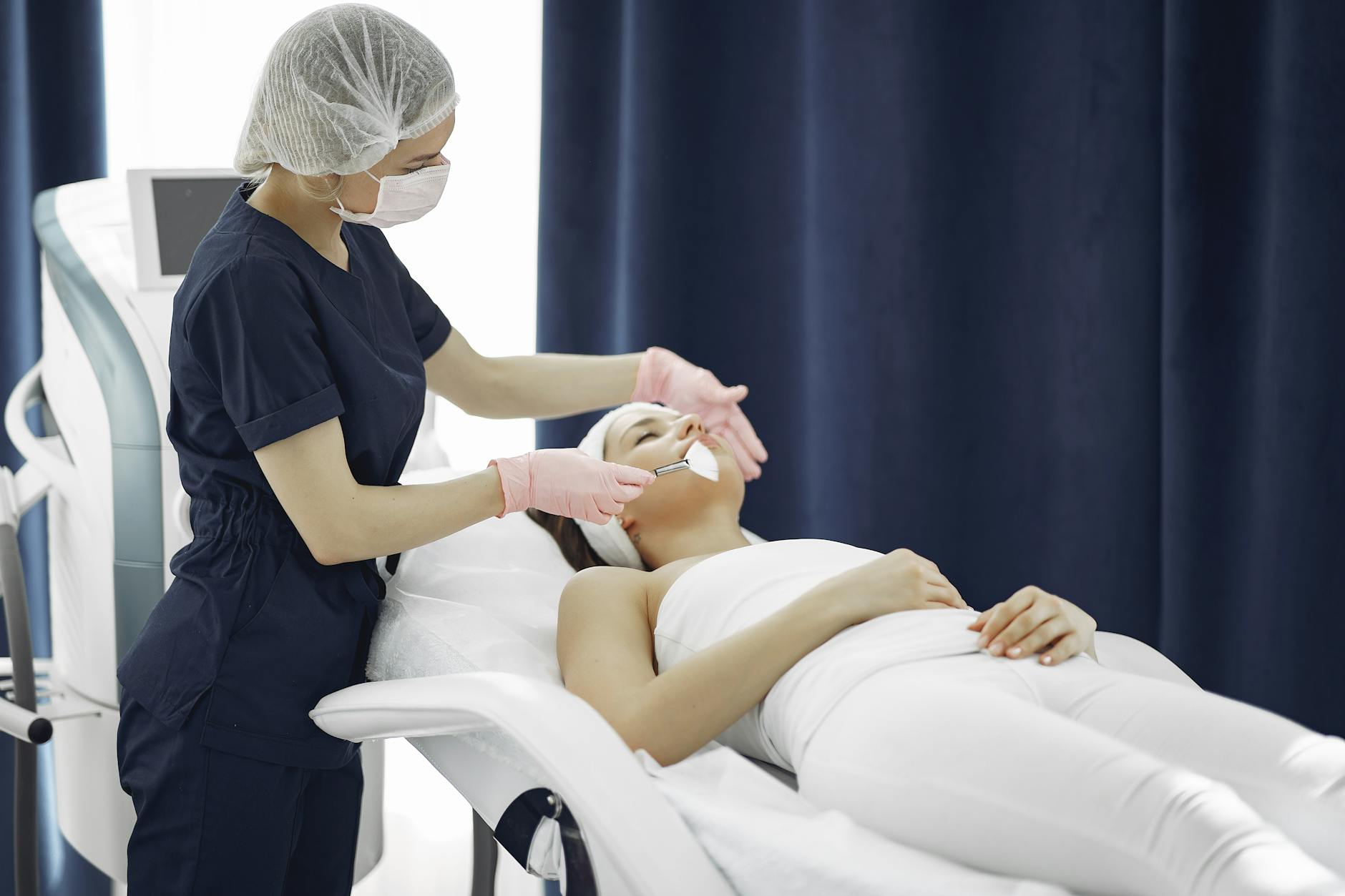 Professional skincare treatment being performed in modern spa setting