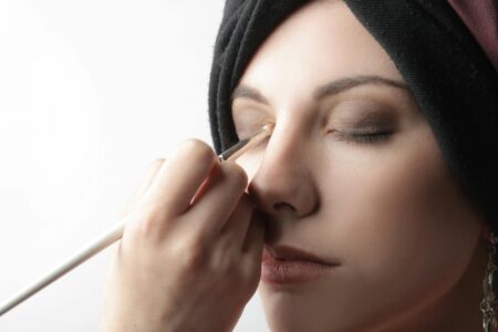 Close-up of woman's eye with bold black eyeliner in dramatic winged style
