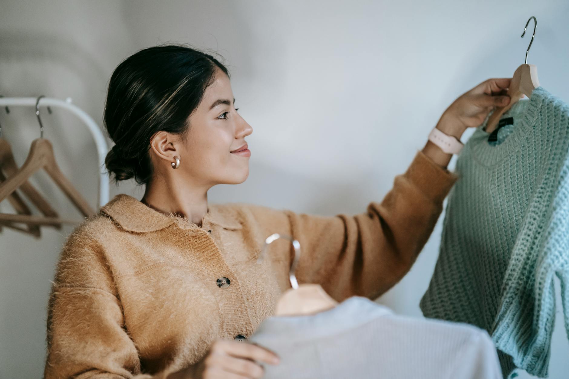 Woman wearing a knitted cardigan showcasing modern crochet fashion styling and sophisticated aesthetic