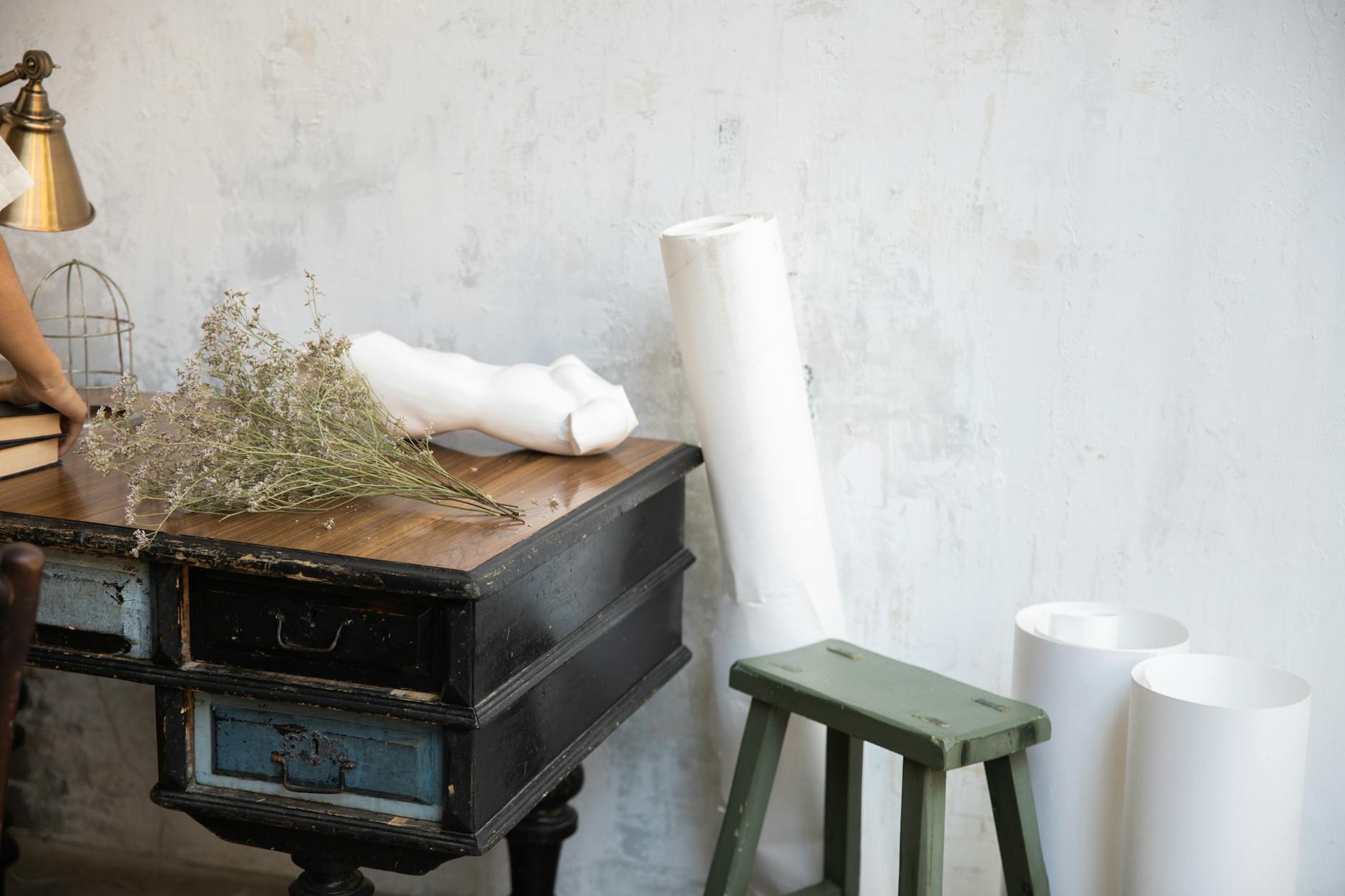 Creative designer workspace with sketches and materials for fashion development