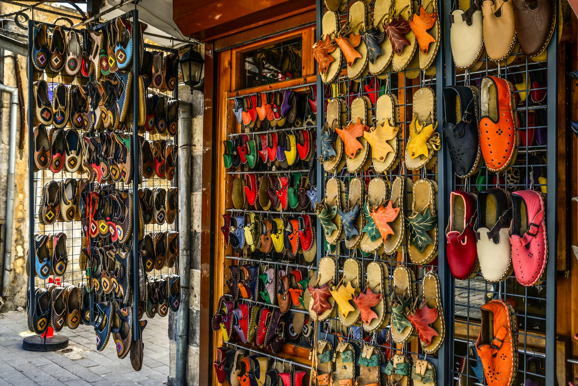 Modern retail shoe display featuring various comfortable sneaker styles arranged on clean shelving