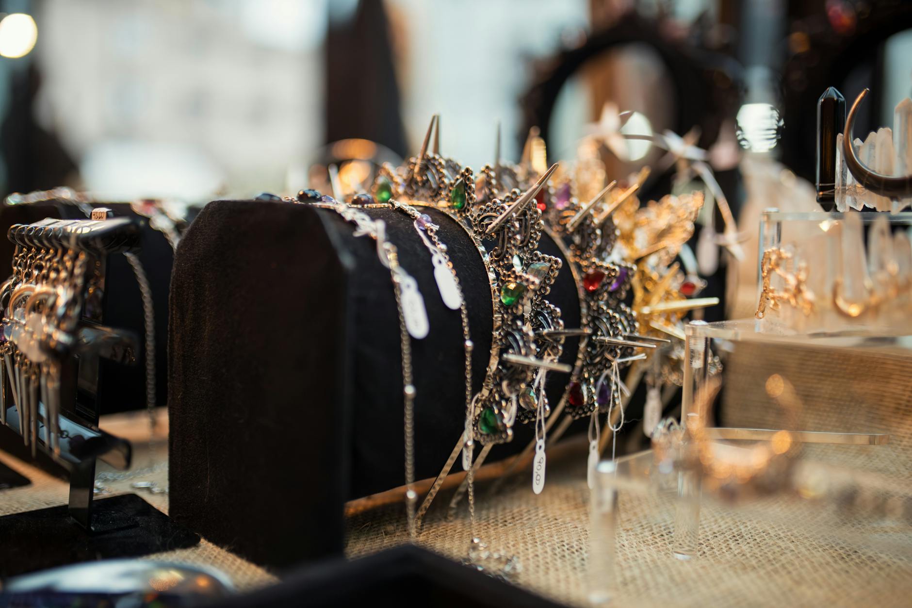Collection of modern statement earrings arranged on clean surface showing various geometric designs