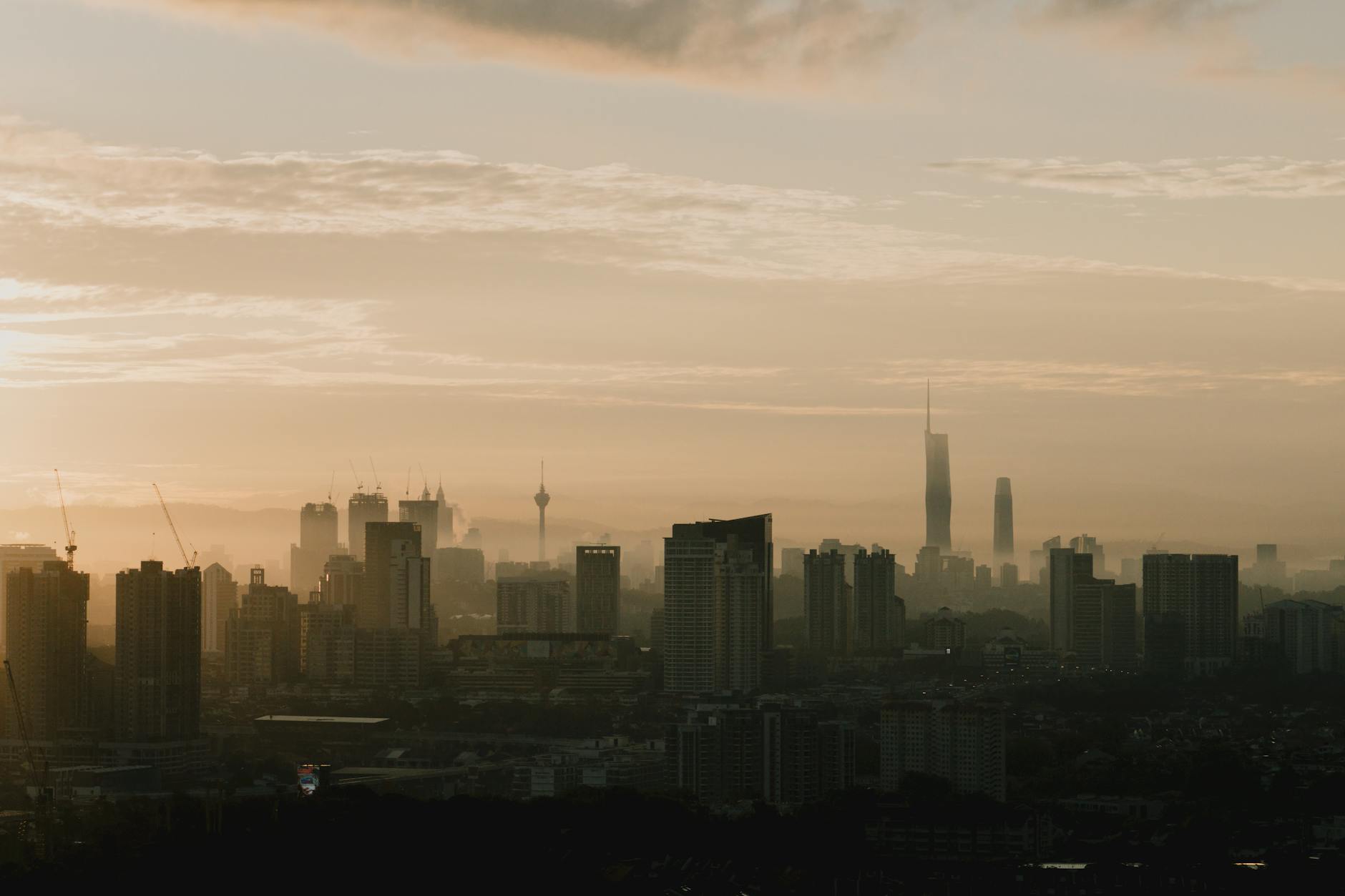 London city skyline showing elevated buildings and rooftop spaces during daylight