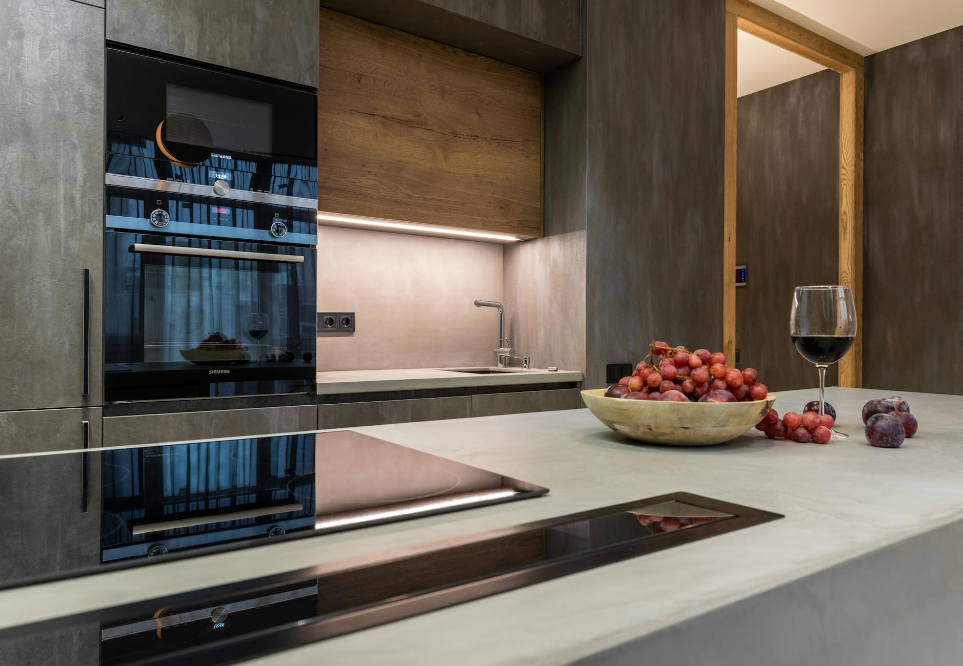 Upscale modern kitchen with premium appliances and clean countertops