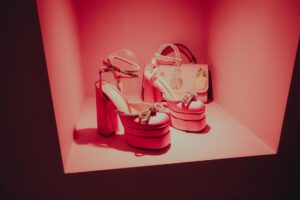 Elegant luxury footwear displayed in upscale retail environment