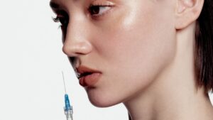 FDA Considers Lifting Restrictions on Beauty-Focused Injectable Peptides Medical syringe prepared for injection treatment
