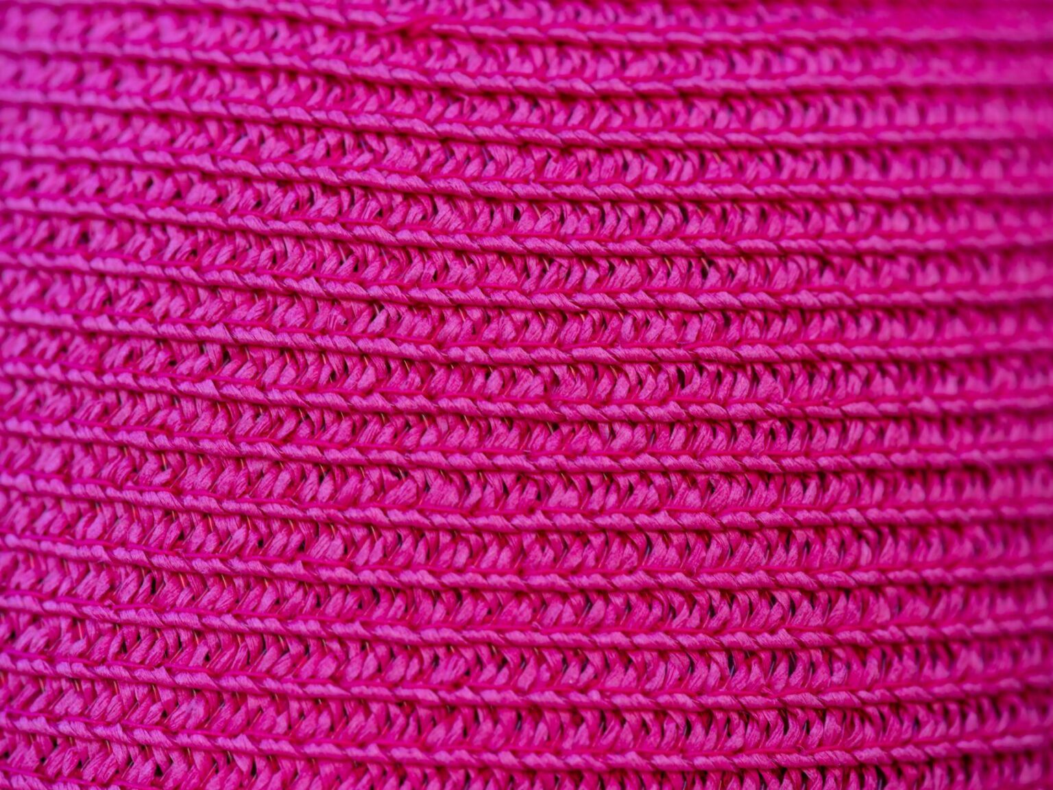 Close-up of a knit-upper athletic sneaker showing woven textile construction