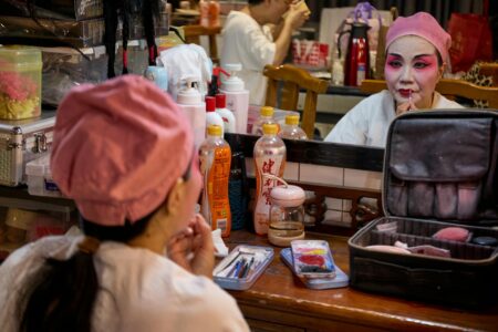 Close-up of dramatic stage makeup with bold eye shadow and contour for a theatrical production
