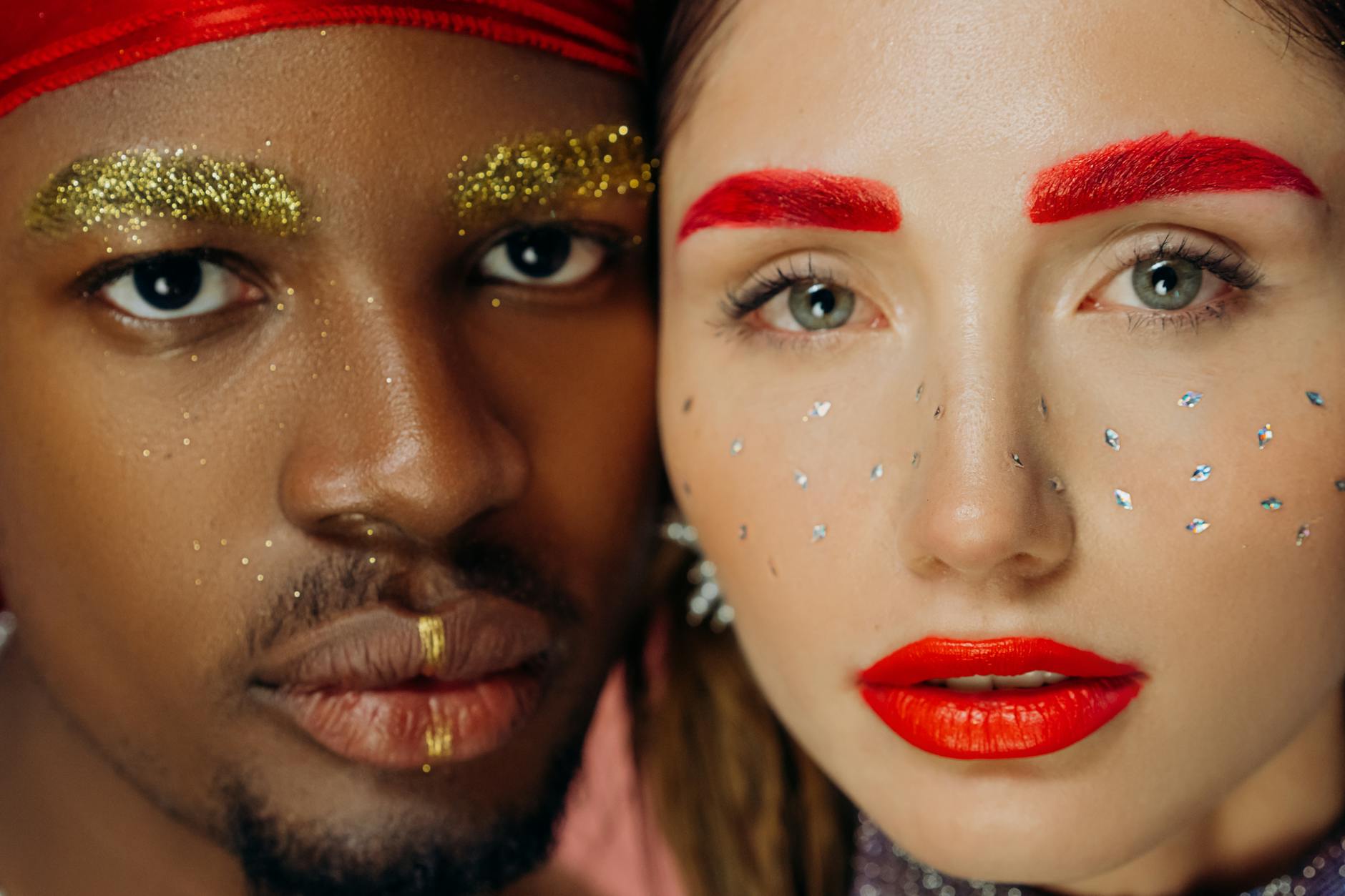 Close-up of dramatic rhinestone and glitter eye makeup inspired by maximalist TV beauty trends