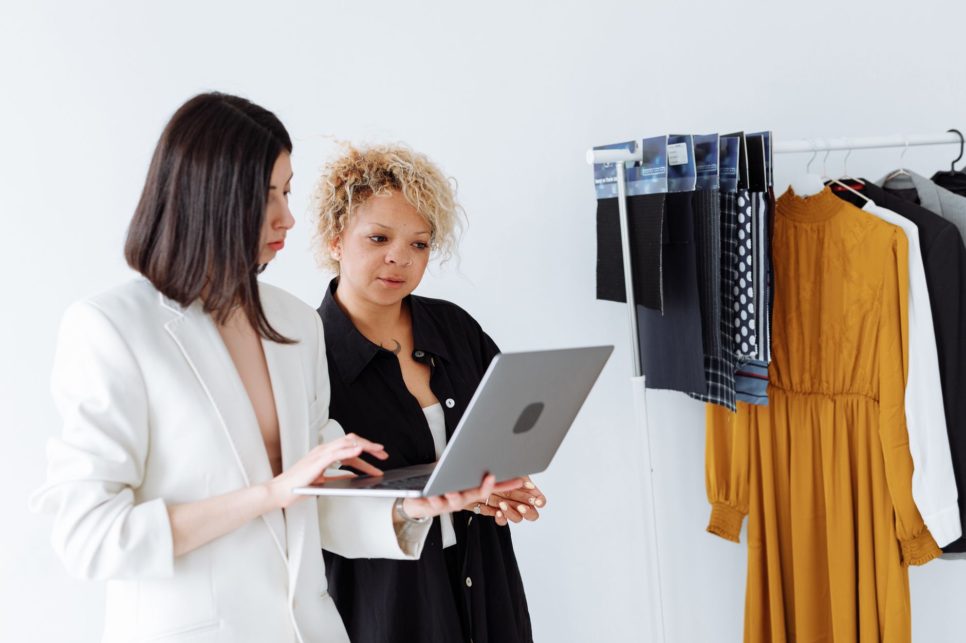 Professional woman in a fashion industry context representing female executives recognized in footwear