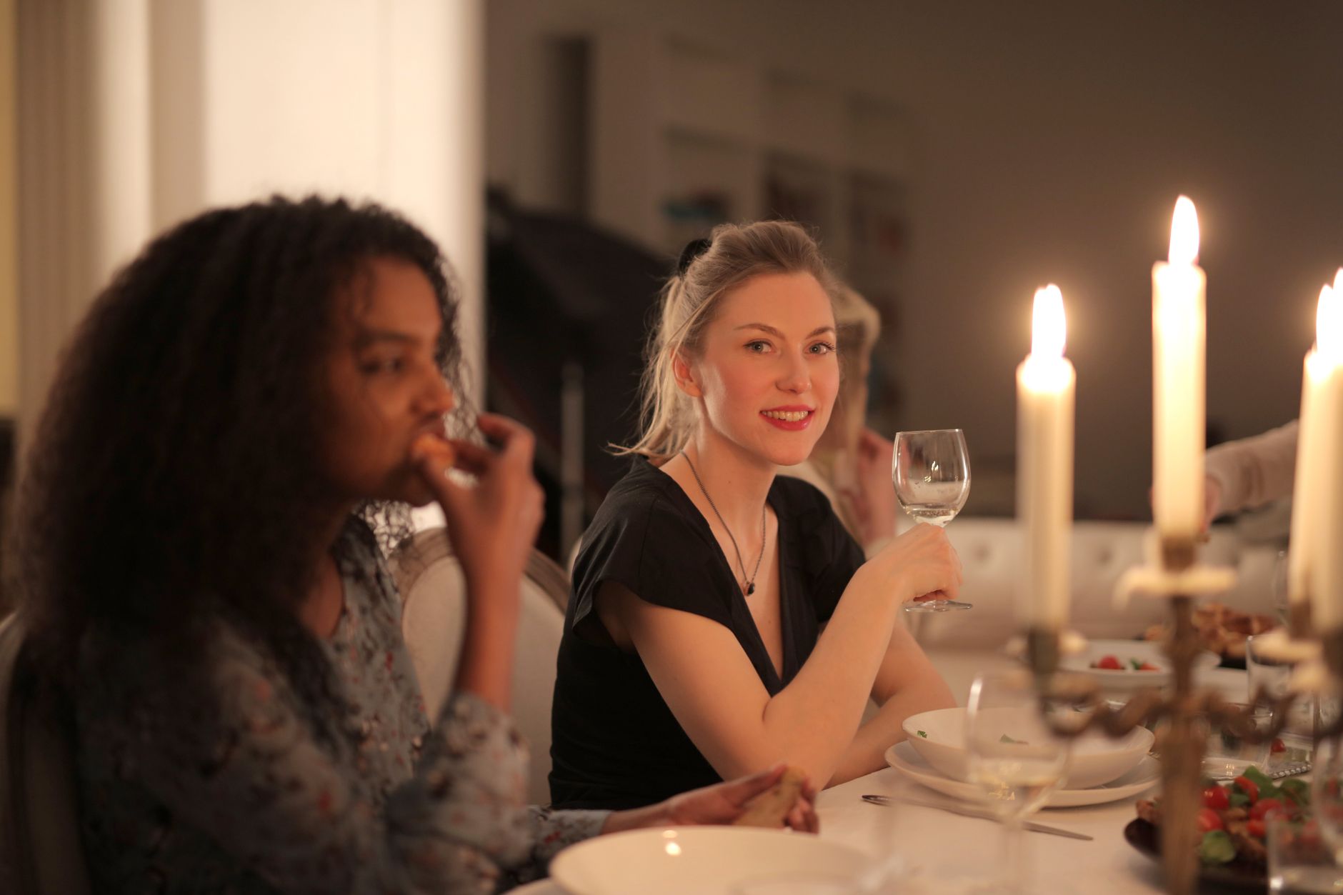 Women gathered at an industry dinner event in a restaurant setting