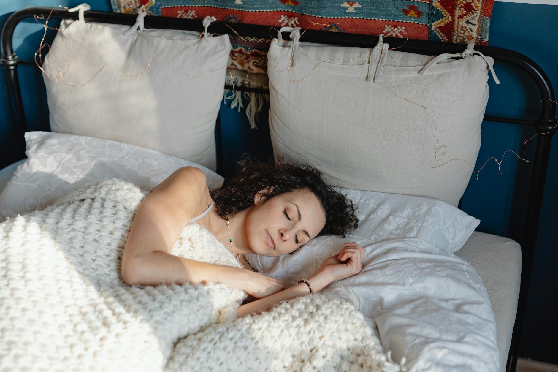Woman resting peacefully representing nervous system recovery during sleep