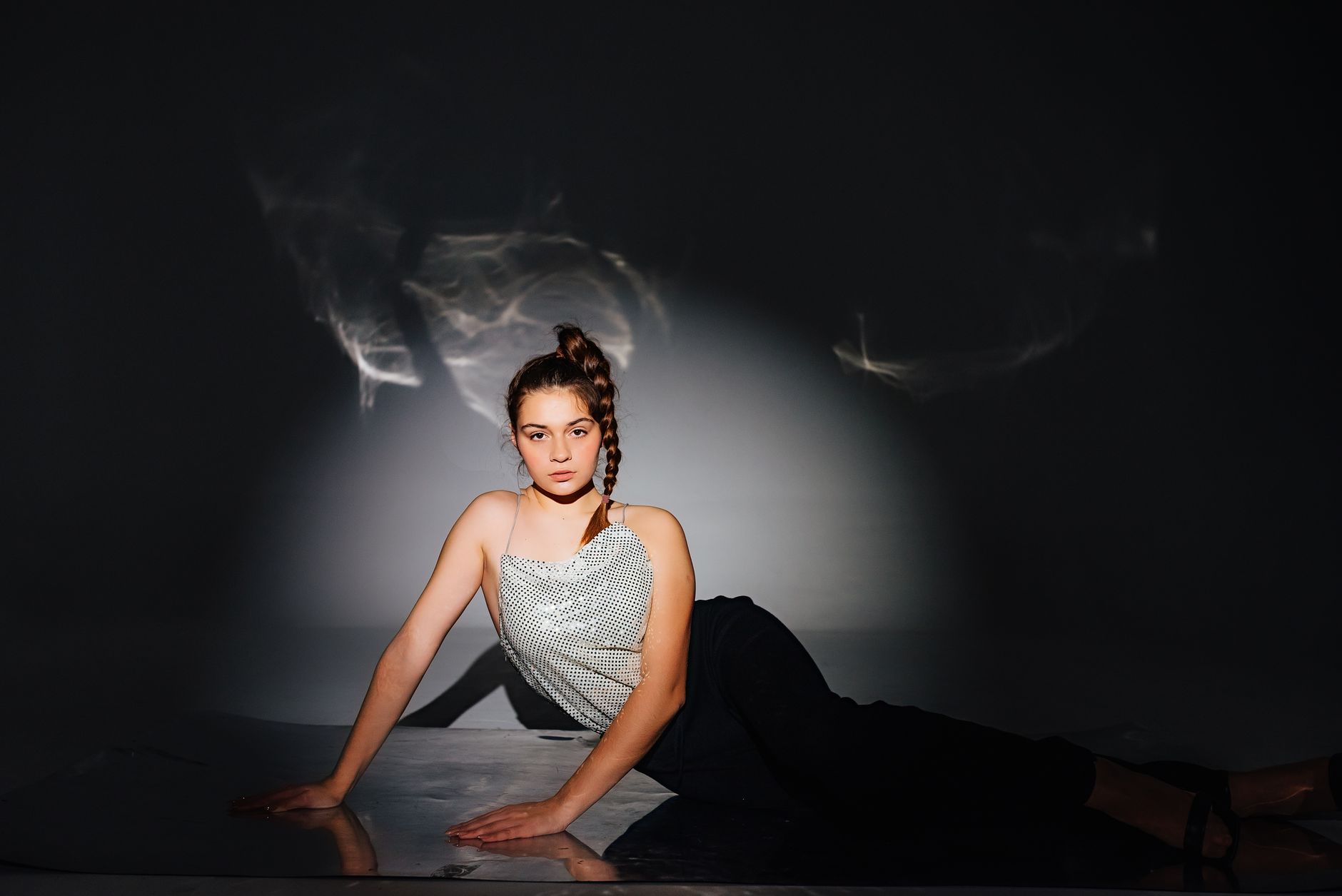 Studio portrait of a woman with dramatic editorial makeup