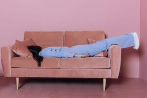 Woman practicing slow breathing to reduce stress and lower cortisol levels