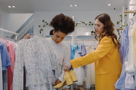 Women's apparel on display in a retail store setting