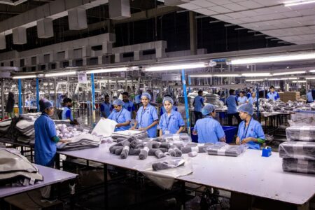 New Balance Schedules Nine Made in USA Drops for Fall 2026 Close-up of sneakers being assembled on a production line in a domestic factory