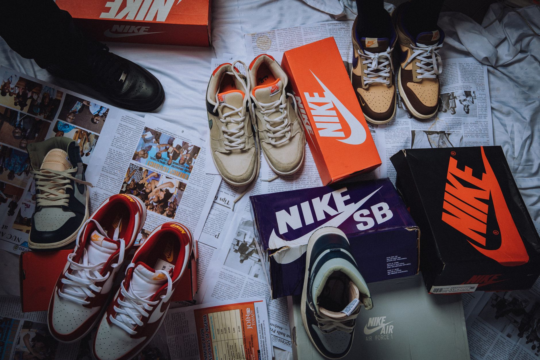 Sneaker collection displayed on shelving in a retail environment