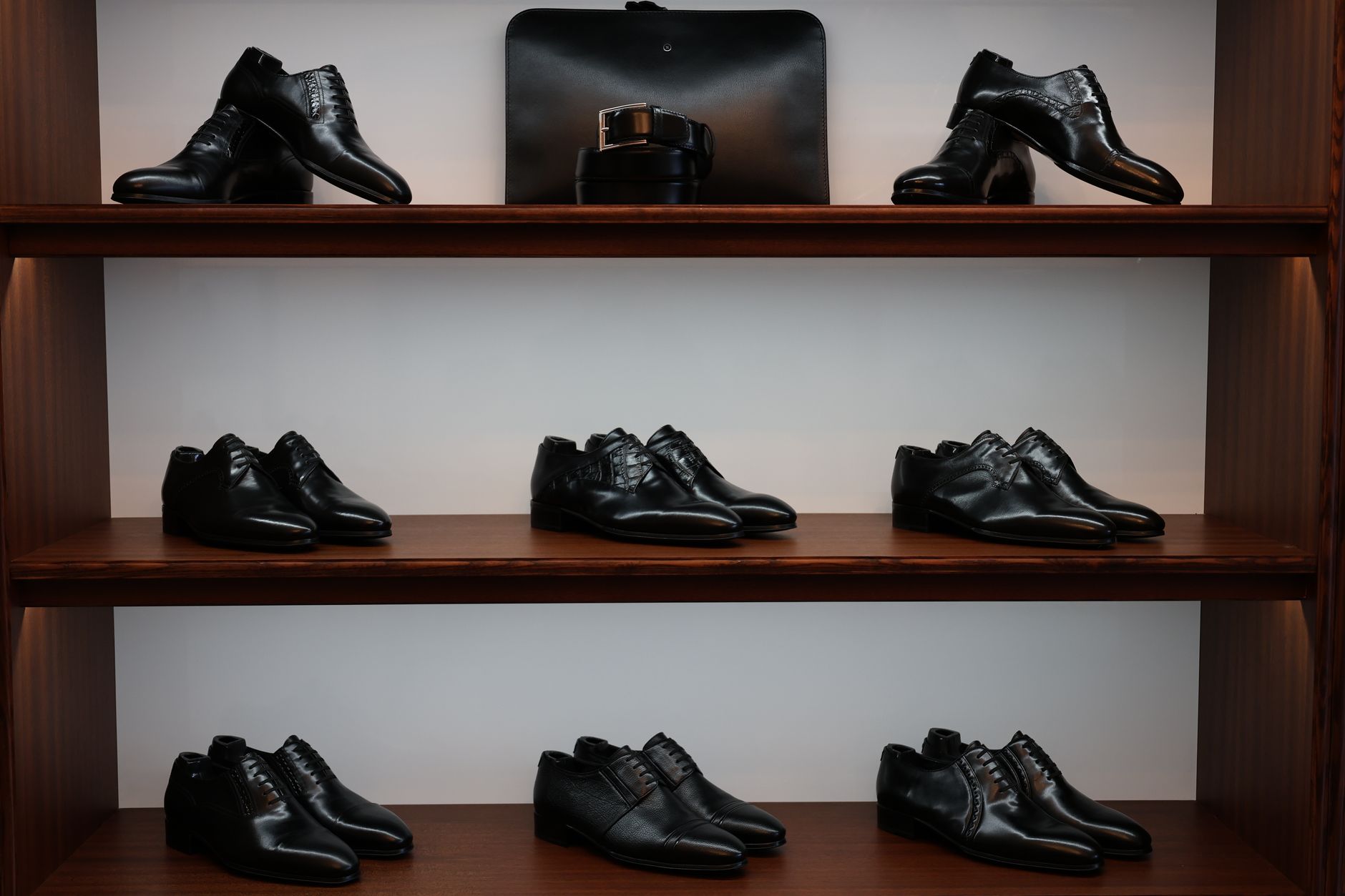 Elegant footwear display in a modern retail setting