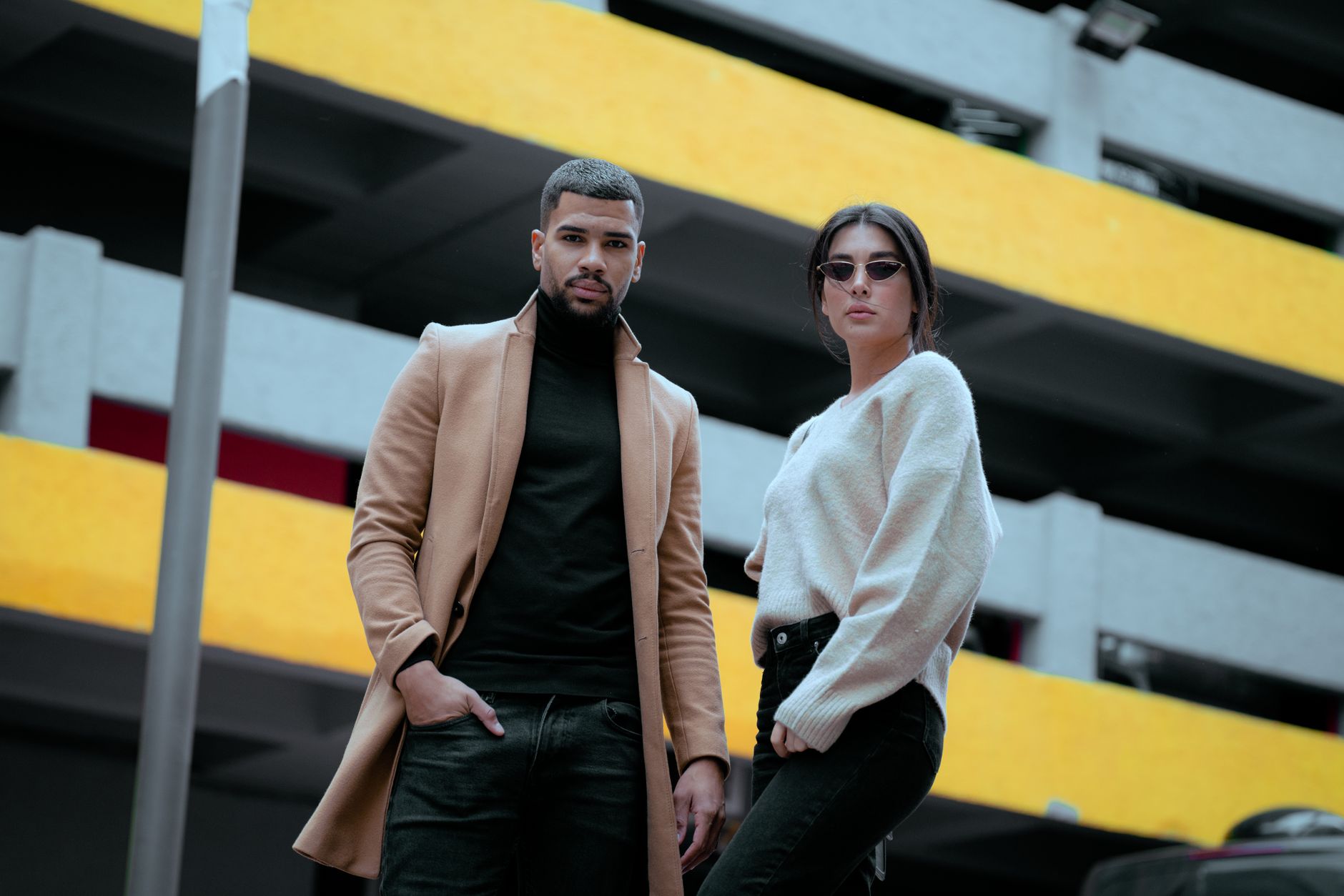 Men's and women's elevated fashion styles displayed together