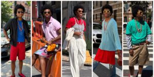 Model wearing layered early-2000s inspired outfit with dress over pants
