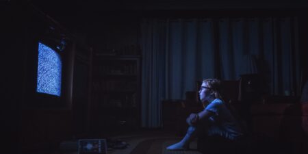 Atmospheric horror film set with dramatic lighting and eerie mood