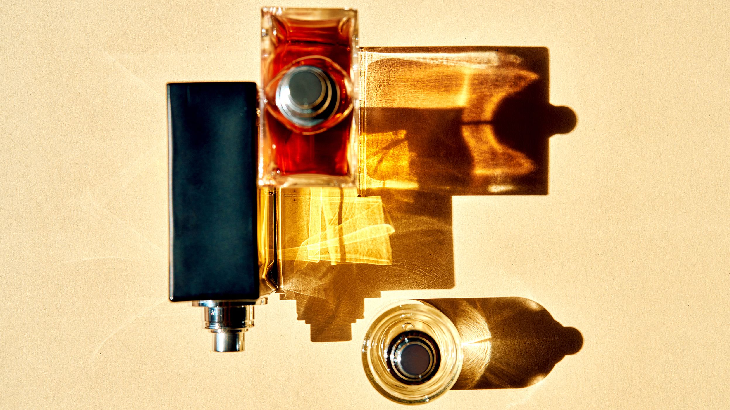 Cloves, black pepper, and warm spices arranged on a dark surface representing fall fragrance notes