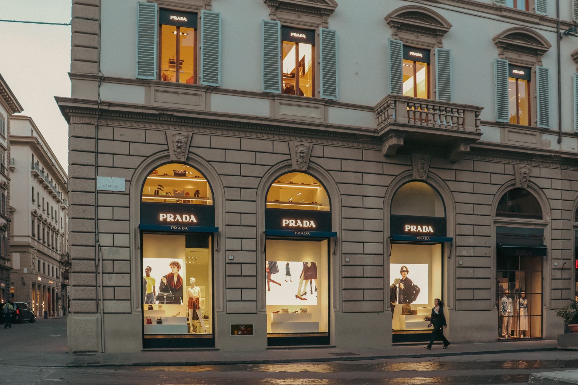 Interior of a high-end luxury fashion boutique with designer displays