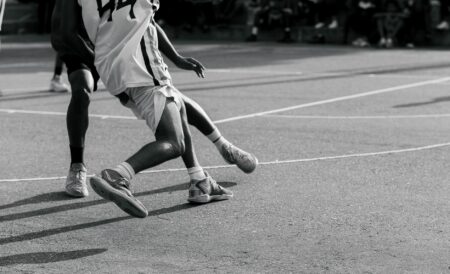 Close-up of basketball sneakers on an indoor court