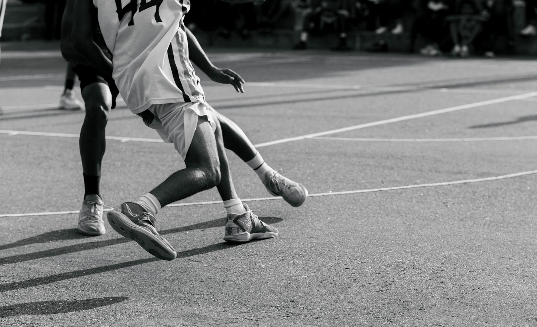 Close-up of basketball sneakers on an indoor court