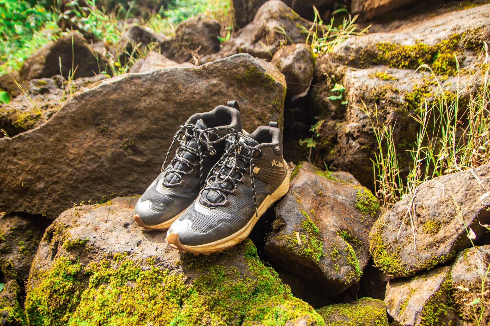 Merrell-style hiking boots on a trail path outdoors