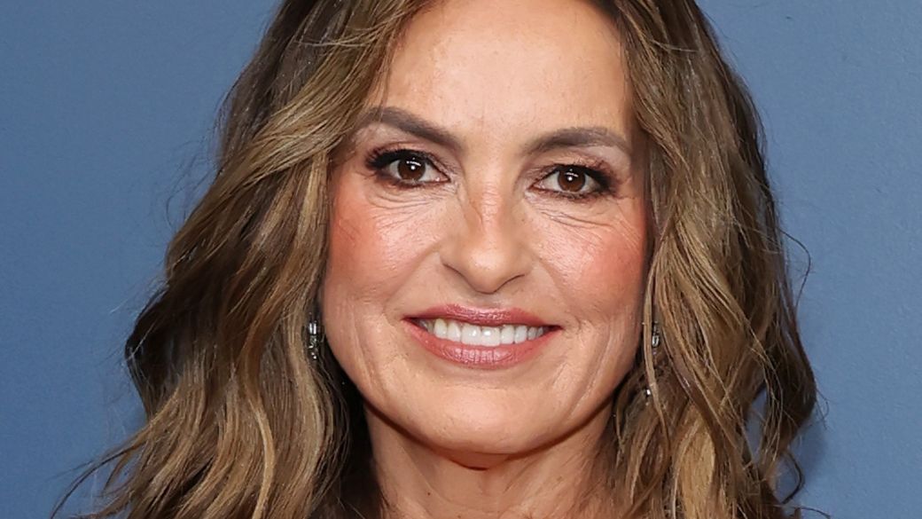 Glamorous high-volume blowout hairstyle reminiscent of old Hollywood styling