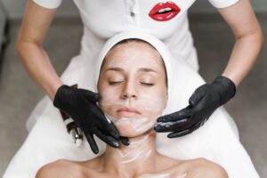 Silver Mirror’s Volmira Facial Targets Skin Changes From GLP-1 Weight Loss Esthetician performing a professional facial treatment in a clean spa setting