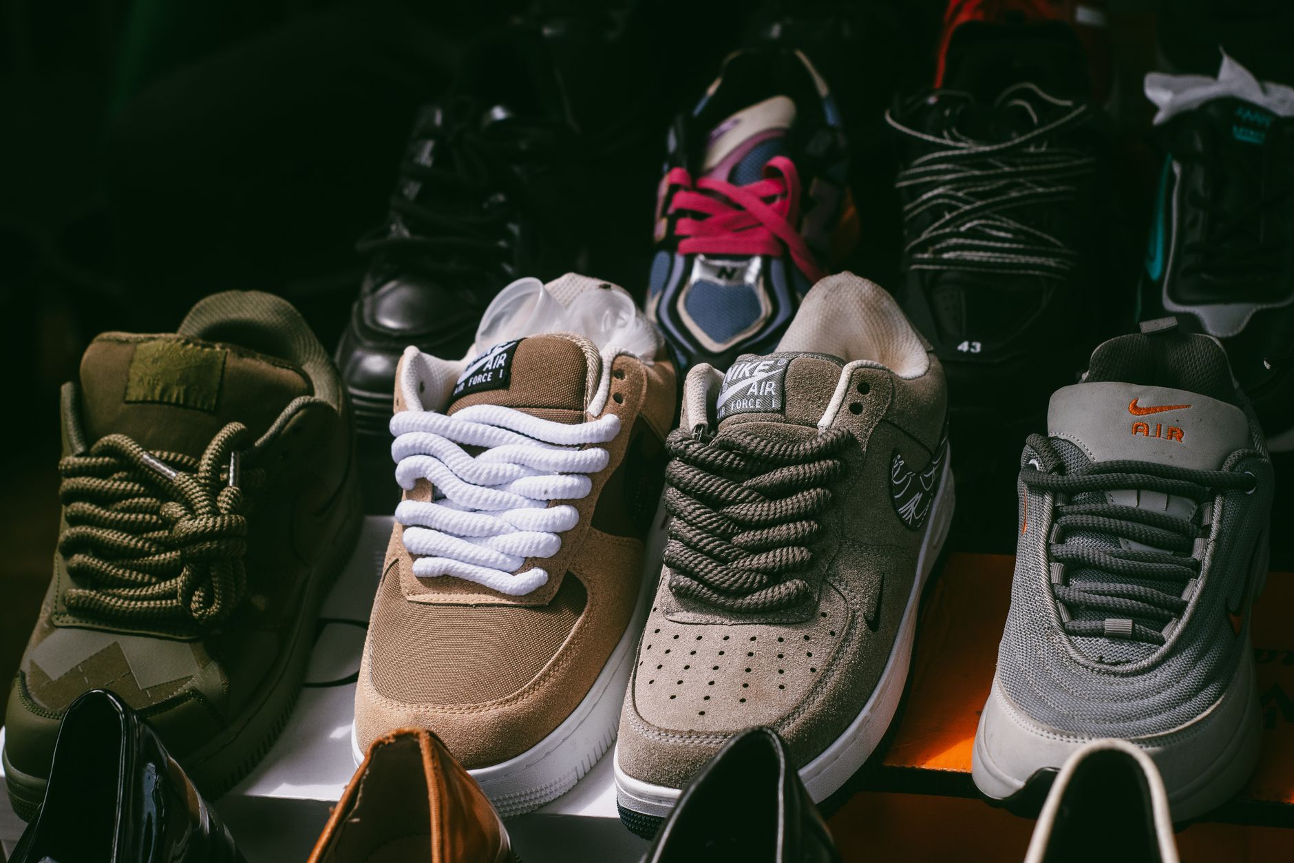 Colorful sneaker collection displayed on a retail surface