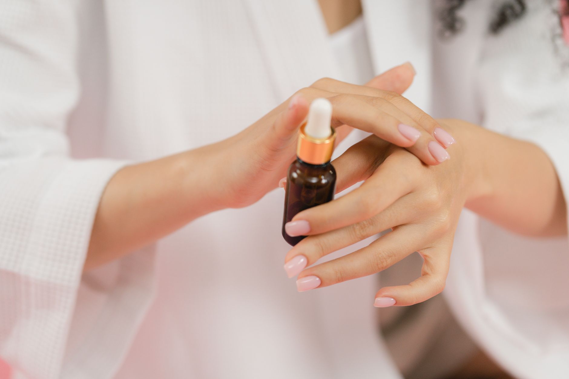 Close-up of a woman receiving a professional skin care treatment