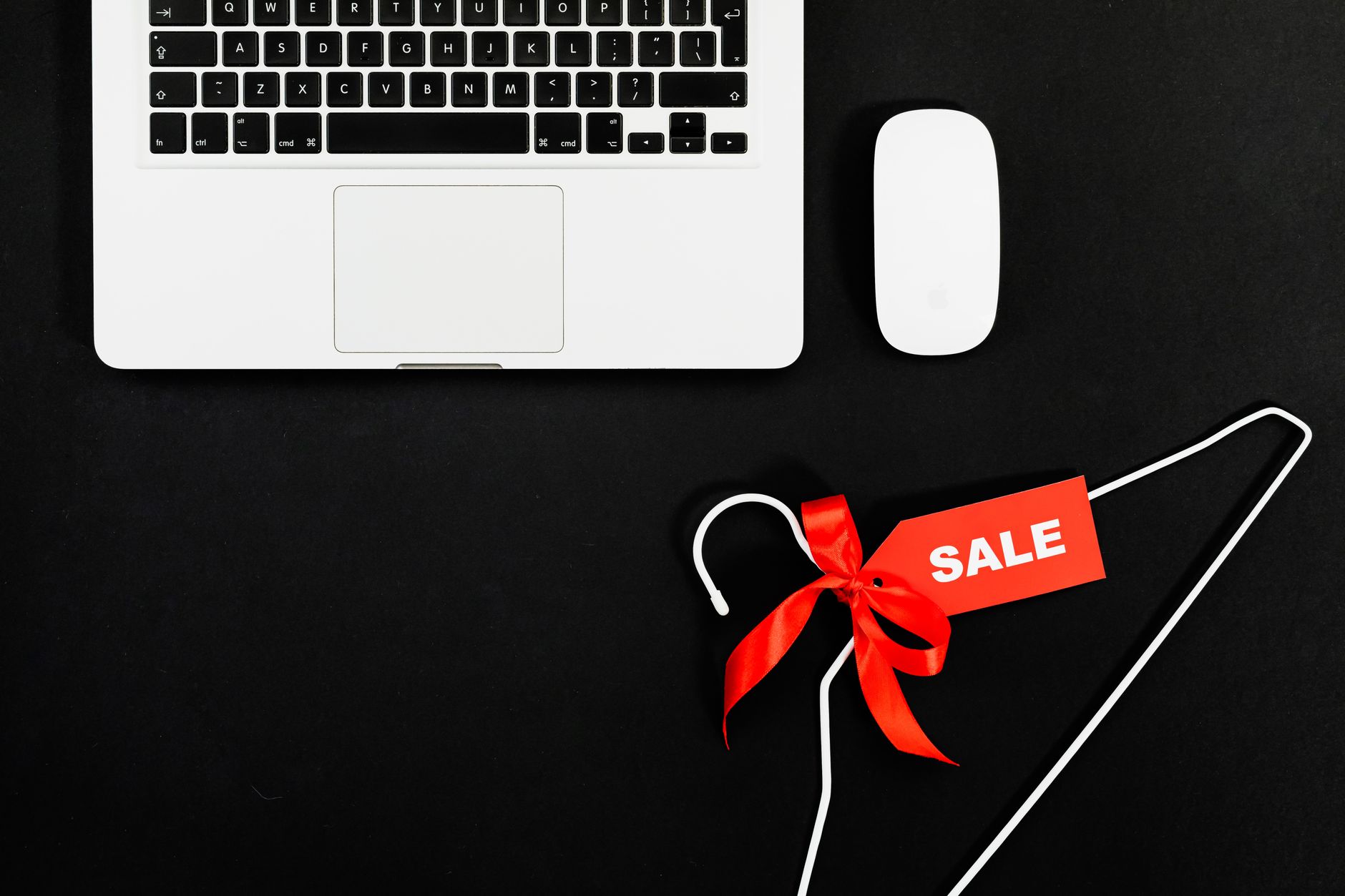 Person browsing fashion items on an e-commerce website