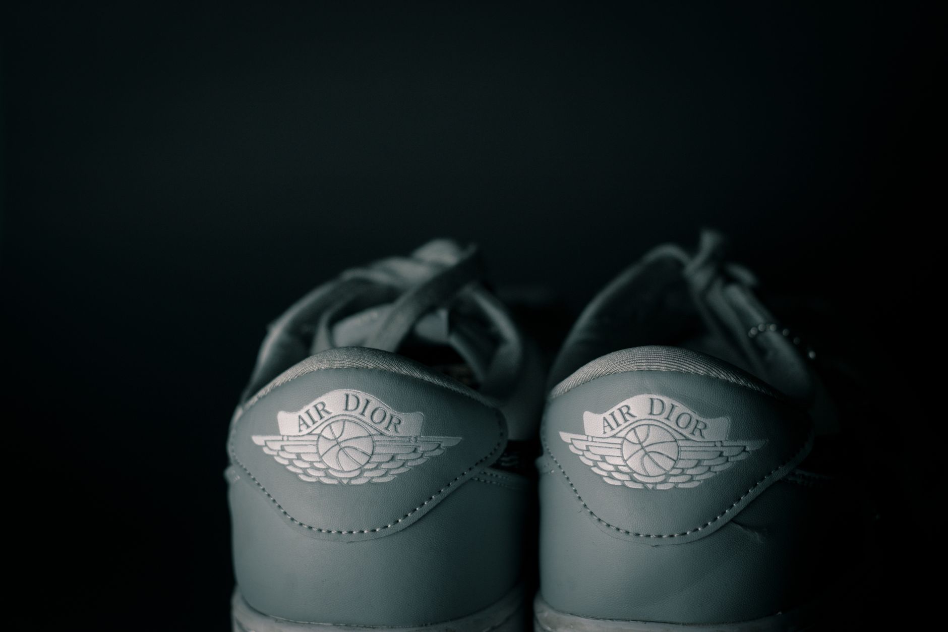 Elegant designer heeled sandals displayed against a neutral background